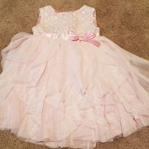 Pink dress with lace detail on bodice